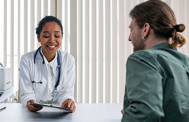 photo of a doctor talking the patient