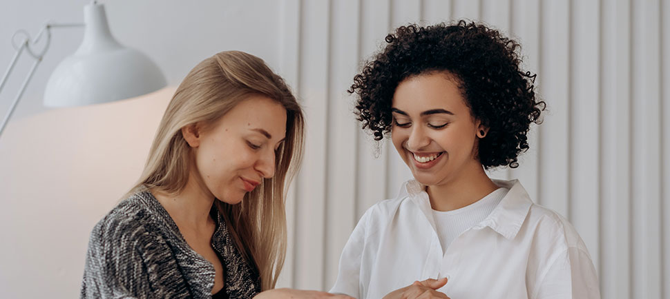 photo of two women smiling
